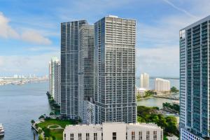 an aerial view of a city with tall buildings at Luxury 45th Floor Suite at Icon in Miami