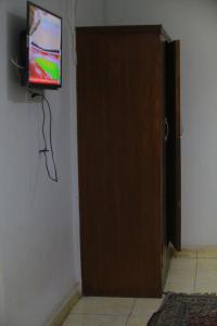 Telewizja i/lub zestaw kina domowego w obiekcie Claridge Cairo Downtown