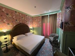 Ліжко або ліжка в номері Demidoff Hotel Milano