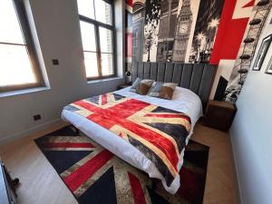 Postel nebo postele na pokoji v ubytování Le Manoir du Monde