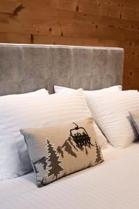 Grey Castle garnì&suite客房内的一张或多张床位