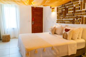 Pousada Solarium de Gostoso客房内的一张或多张床位