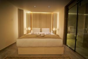 Letto o letti in una camera di Gold's Pyramids Hotel