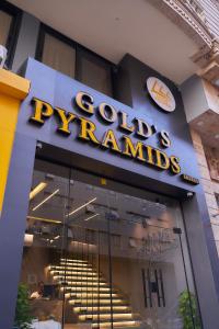 Certificato, attestato, insegna o altro documento esposto da Gold's Pyramids Hotel