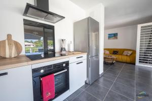 Köök või kööginurk majutusasutuses L'Anse Plage appartement 2 chambres avec spa à 200 m de la plage, jardin Privé et Parking