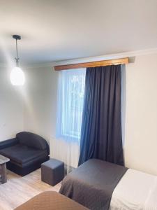 Letto o letti in una camera di Guest House on Meskheti
