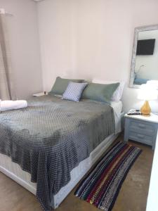 Chalézinho Santorini & Eventos客房内的一张或多张床位