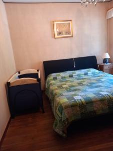 Postel nebo postele na pokoji v ubytování Cà dul straciatin