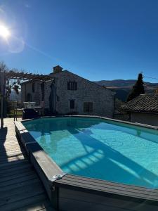 Bazén v ubytování Appartement à la ferme nebo v jeho okolí