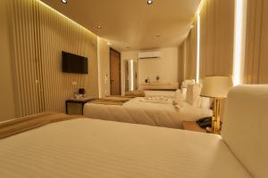 TV o dispositivi per l'intrattenimento presso Gold's Pyramids Hotel