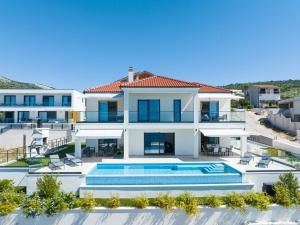 an image of a villa with a swimming pool at Villa Infinity View in Primošten