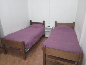 Postel nebo postele na pokoji v ubytování Hostal 4 Estaciones