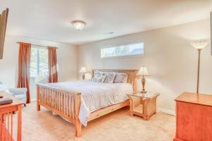 a bedroom with a bed and a window at The Osprey - Meredith Lodging in Bend