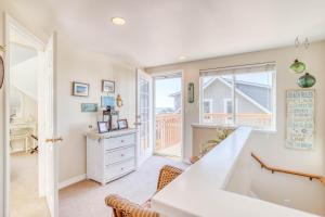 a home office with a desk and a window at Siren Song in Lincoln City
