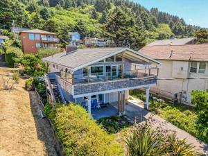 an aerial view of a house with a roof at Captains Quarters in Lincoln City