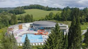 an aerial view of a resort with a swimming pool at Apartmány Staroměstská romance in Staré Město