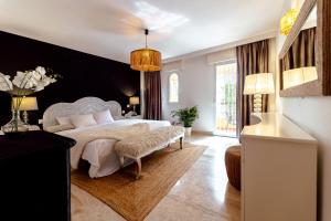 Postel nebo postele na pokoji v ubytování Elviria beach