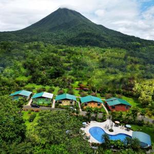an aerial view of the resort with a mountain in the background at Hotel Villas Vilma in Fortuna