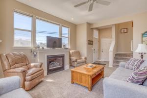 a living room with a fireplace and a tv at Seaside Vacation Rental in Seaside