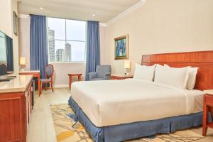 Cama ou camas em um quarto em Waymore Hotel Spa & Casino