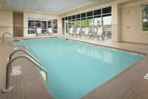 a large pool with blue water in a building at Hilton Garden Inn Chattanooga/Hamilton Place in Chattanooga