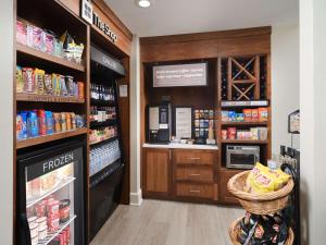 a grocery store aisle with a pharmacyacistacistacistacist at Hilton Garden Inn Chattanooga/Hamilton Place in Chattanooga