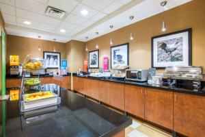 a restaurant with a buffet line in a cafeteria at Hampton Inn & Suites Oklahoma City - South in Oklahoma City