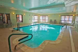 a large swimming pool in a hotel room at Hampton Inn Hampton-Newport News in Hampton