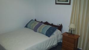 Postel nebo postele na pokoji v ubytování Hostal Cuesta de Belén