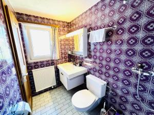 Kopalnica v nastanitvi Apartment with balcony and Panoramic Views of Alps