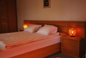Postelja oz. postelje v sobi nastanitve Apartment with balcony and Panoramic Views of Alps