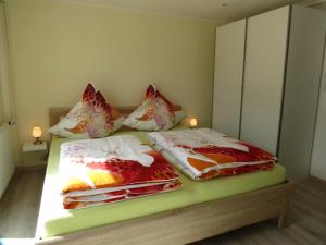 Ein Bett oder Betten in einem Zimmer der Unterkunft Ferienoase ENGEL