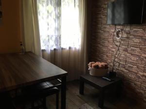 TV a/nebo společenská místnost v ubytování La Cabaña de Bella