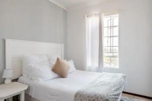 Ένα ή περισσότερα κρεβάτια σε δωμάτιο στο Kempton Park Self Catering Private House Nearby to OR Tambo International Airport