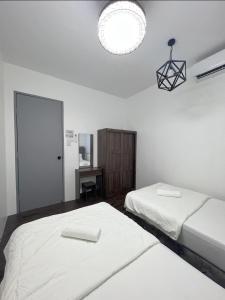 מיטה או מיטות בחדר ב-SDC Suite Home