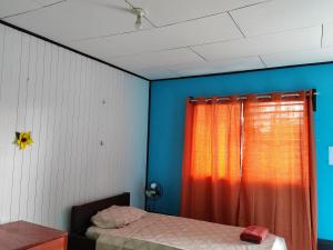 Postel nebo postele na pokoji v ubytování Hotel Gaviotas de Osa