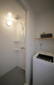 Kuchyň nebo kuchyňský kout v ubytování 2F SAKURA RIVER HOUSE, yao 桜と川の家 2F