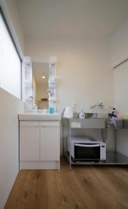Fotografie z fotogalerie ubytování 2F SAKURA RIVER HOUSE, yao 桜と川の家 2F v destinaci Yaochō + 16 fotografií
