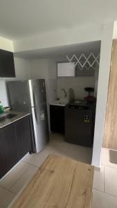 Una cocina o zona de cocina en Hermoso Apartamento en exclusiva zona ibague Calambeo