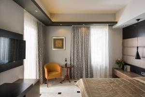 TV a/nebo společenská místnost v ubytování Lito Beach Hotel