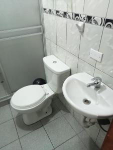 Een badkamer bij Hospedaje Apu Salka