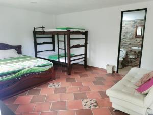 Postel nebo postele na pokoji v ubytování Cabañas Balconcitos