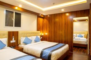 Кровать или кровати в номере Hotel Dreams Connect GRB 2