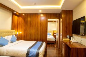 Кровать или кровати в номере Hotel Dreams Connect GRB 2