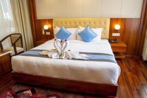 Кровать или кровати в номере Hotel Dreams Connect GRB 2