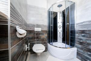 Koupelna v ubytování Mini Hotel Akord