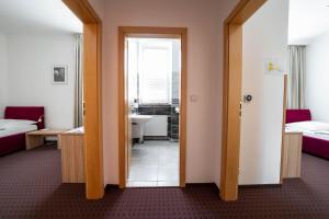 Postel nebo postele na pokoji v ubytování Mini Hotel Akord
