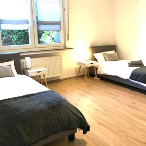 A bed or beds in a room at Am Ziegelhof, Terrasse, WLAN, bis zu 6 Personen