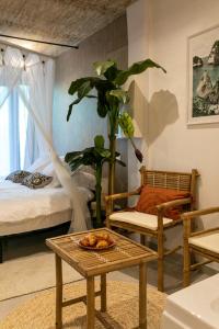 Postel nebo postele na pokoji v ubytování Bali Serenity Balnéo et lit rond
