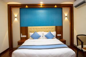Кровать или кровати в номере Hotel Dreams Connect GRB 2